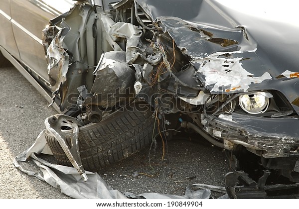 Front part of a crashed car\
wreck