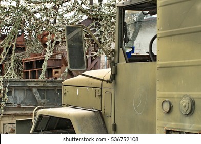 Front Part Of Green Old Military Truck.