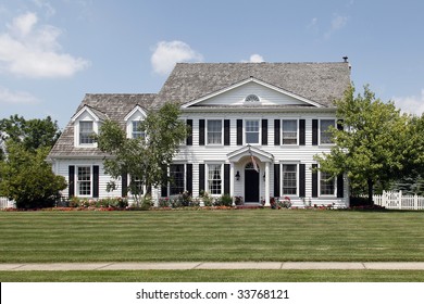 Front Photo Of Colonial Home In Suburbs