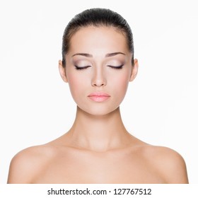 Front portrait of beautiful face with beautiful closed eyes - isolated on white