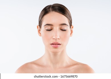 Front portrait of beautiful face with beautiful closed eyes isolated on white background