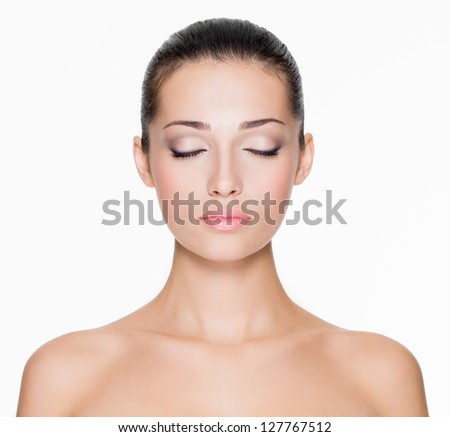 Front portrait of beautiful face with beautiful closed eyes - isolated on white