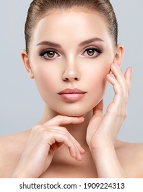 Front Portrait Of A White Young Woman With Beauty Face - Isolated. Skin Care Concept. Young Adult  Caucasian Girl With A Clean Skin.