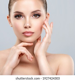 Front Portrait Of A White Young Woman With Beauty Face - Isolated. Skin Care Concept. Young Adult  Caucasian Girl With A Clean Skin.