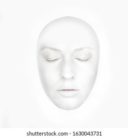 Front portrait of the woman with white face like a mask - isolated on white - Powered by Shutterstock