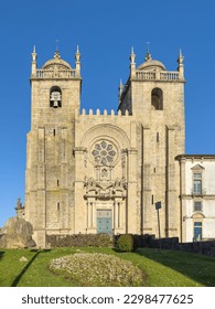 Front of the Romanesque Porto Cathedral (Se do Porto). The Porto Cathedral is a popular tourist attraction of Portugal. The historic centre of Porto was designated a UNESCO World Heritage site