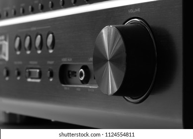 Front side of the AV receiver with volume knob close-up