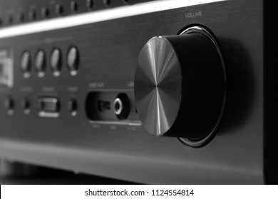 Front side of the AV receiver with volume knob close-up