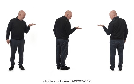 front side and back view of same man showing an imaginary object in her hand on white background - Powered by Shutterstock