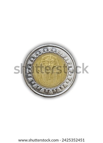 The front side of the Egyptian coin features the face of the Pharaoh with a white background