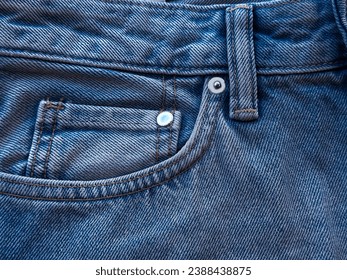 Front side and pockets of blue jeans pants close-up - Powered by Shutterstock