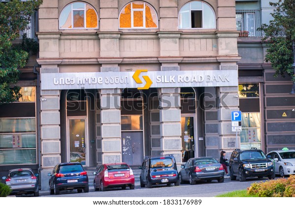 Front side of Silk road\
bank building entrance with many cars parked. 7th october, 2020.\
Tbilisi.Georgia