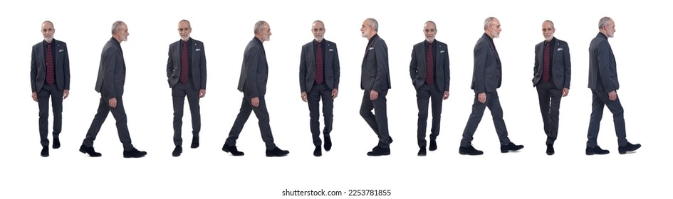 front and side view of same man with suit and tie walking on white background - Powered by Shutterstock