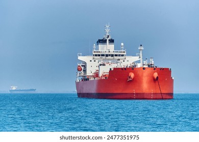 front starboard view of oil product and chemical tanker at anchorage.