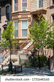 Front Stoop With Decorative Railing To Row Home In Park Slope, Brooklyn In New York