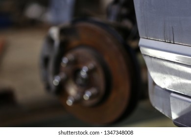 Front Strut With Brake Disc On The Car, Machine Repair