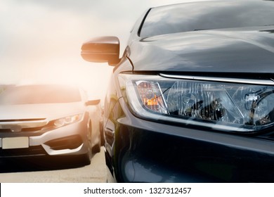 In Front Of Two Cars Heading And Race Drag On The Asphalt Road.