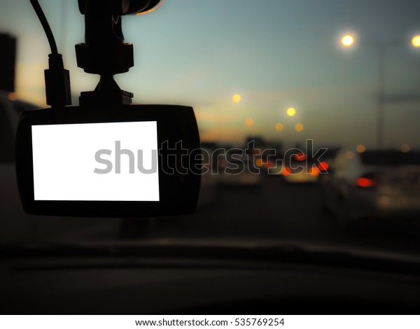 Front video recorder  cars and blank  for text\
 with traffic blurry\
background