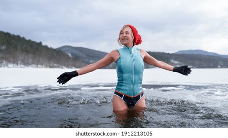 Front View Of Active Senior Woman In Swimsuit Outdoors In Water In Winter, Cold Therapy Concept.