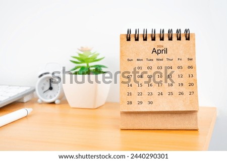 Front view of April 2024 desk calendar on worktable.
