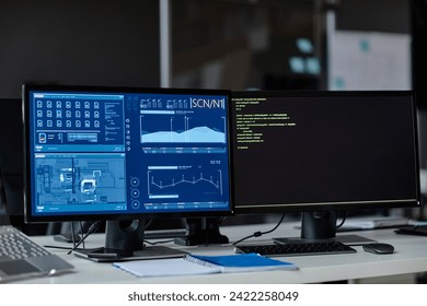 Front view background image of two computers with data charts on screen at workplace in security department copy space