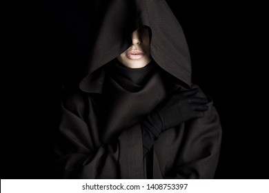 front view of beautiful woman in death costume isolated on black - Shutterstock ID 1408753397