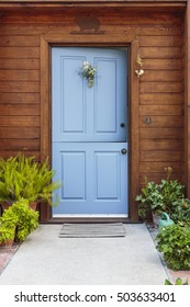 Front View Of A Blue Dutch Door