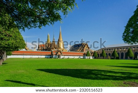 Front view with blue sky of Wat Phra Kaew or Emerald Buddha temple in royal palace Bangkok, Thailand. Travel concept.