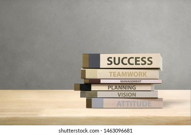 Front View Book Stacking as Step Stair of Step to Success Business on Wooden Desk and Wording Space, Element of success ladder concept for business growth success process.