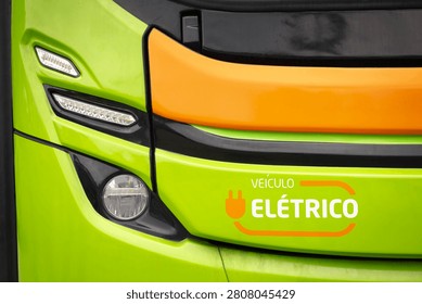 Front view of a bus highlighting the LED headlight assembly, bodywork finish, and electric vehicle identification.