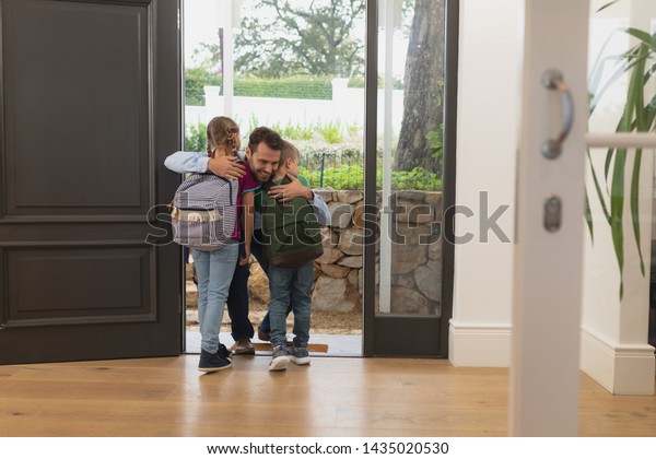 190 Embracing Family On Front Of The Door Images, Stock Photos ...