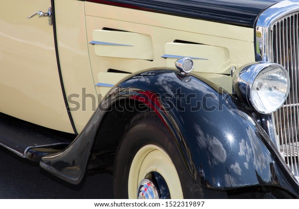 Front\
view of a classic ancient car from the forties\
