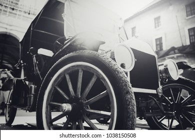 Front View Of Classic Vintage Car. Retro Toned Postcard, Poster.