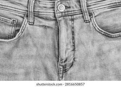 Front view close up grey washed jeans featuring zipper fly, button, and pockets
