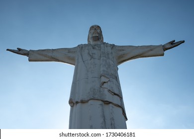 Front view of Cristo del Rey statue of Cali Colombia against a blue sky
