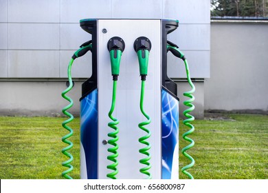 Front view of electrical car charging station in the city.