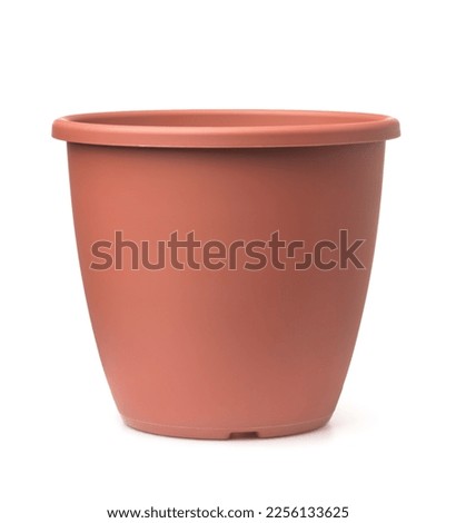 Front view of empty brown plastic flower pot isolated on white