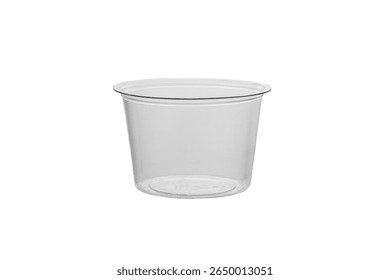 Front view of empty disposable clear plastic sauce cup isolated on white