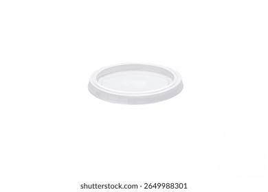 
Front view of an empty disposable transparent plastic cup lid isolated on white background