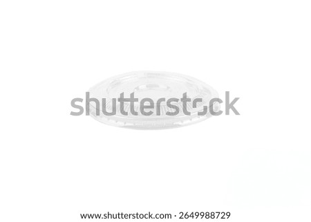 
Front view of an empty disposable transparent plastic cup lid isolated on white background
