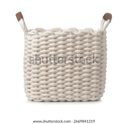 Front view of empty laundry cotton rope basket isolated on white