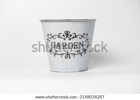 Front view of empty metal bucket isolated on white