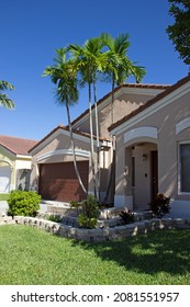 Front View Of Florida House With Garage Door. Florida Real Estate