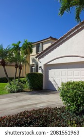 Front View Of Florida House With Garage Door. Florida Real Estate