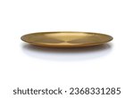 Front view of golden plate isolated on white background. Empty gold round flat plate with shadow. Mock up template for food poster design.