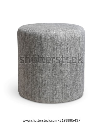 Front view of gray round soft pouffe stool isolated on white