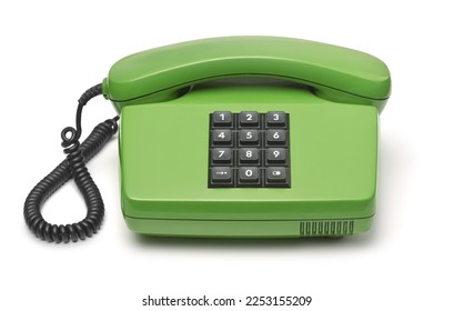 Front view of green classic push-button landline phone isolated on white