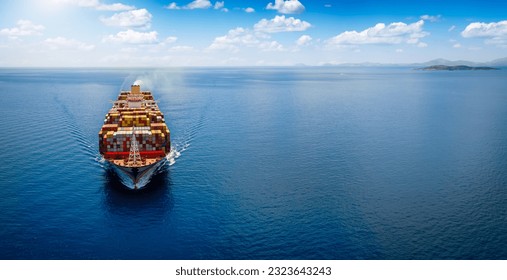 Front view of a large cargo ship carrying containers for import and export, business logistic and transportation in open sea with copy space 