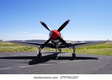 A Front View of a Large Propeller Powered Fighter Plane