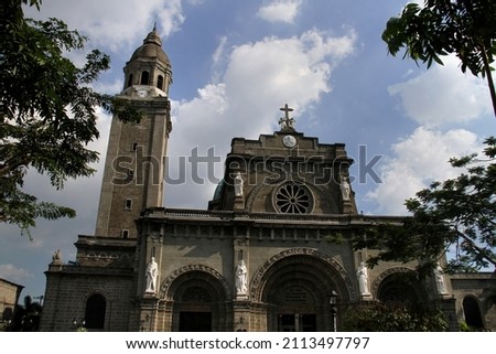 Front view of Manila Cathedral or The Minor Basilica and Metropolitan Cathedral of the Immaculate Conception. It was built in 1571, this historic church is known for its ornate architecture.